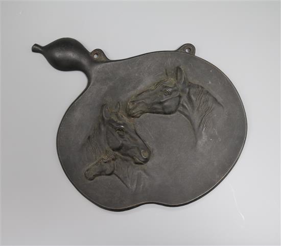 A Japanese cast iron horse plaque